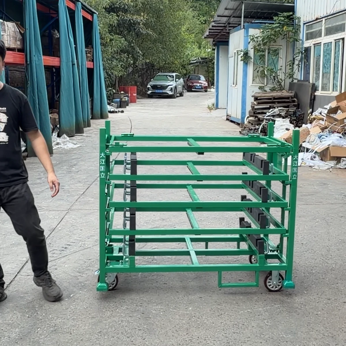 Real product photo of a automotive parts tilting shelf trolley with mobile base, tilting shelves and fixture blocks