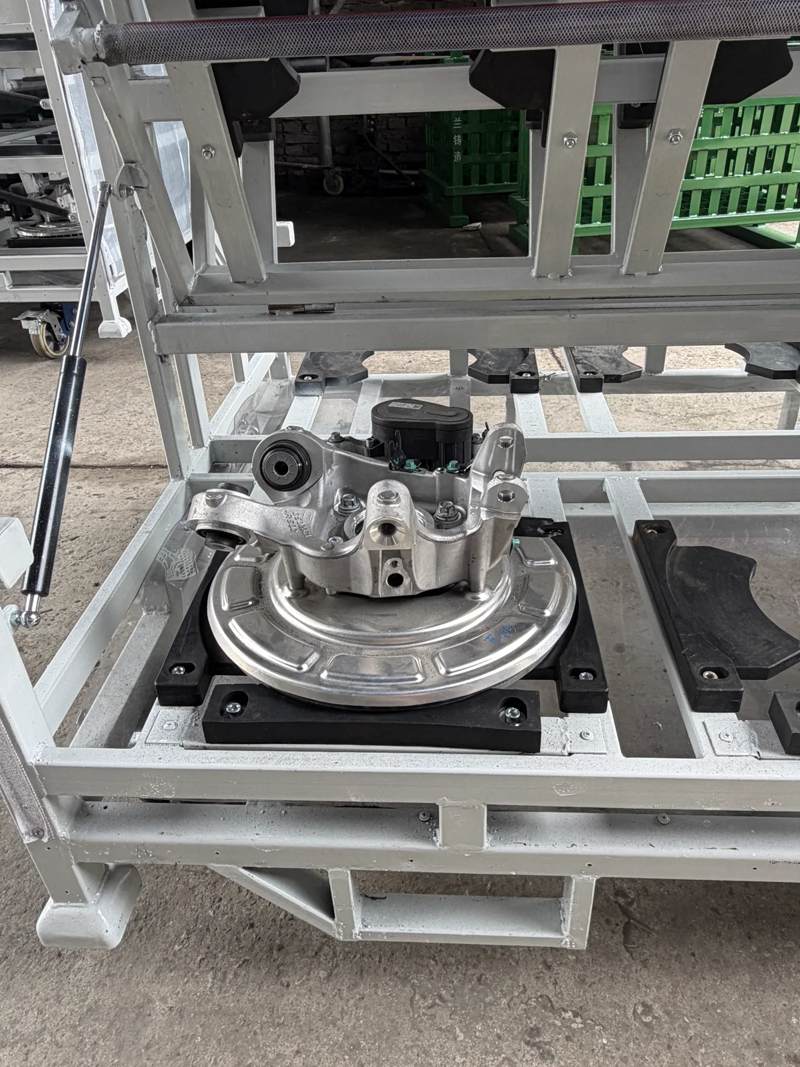 Custom automotive brake booster returnable rack with part-specific dunnage and fold-down access — configuration view 2
