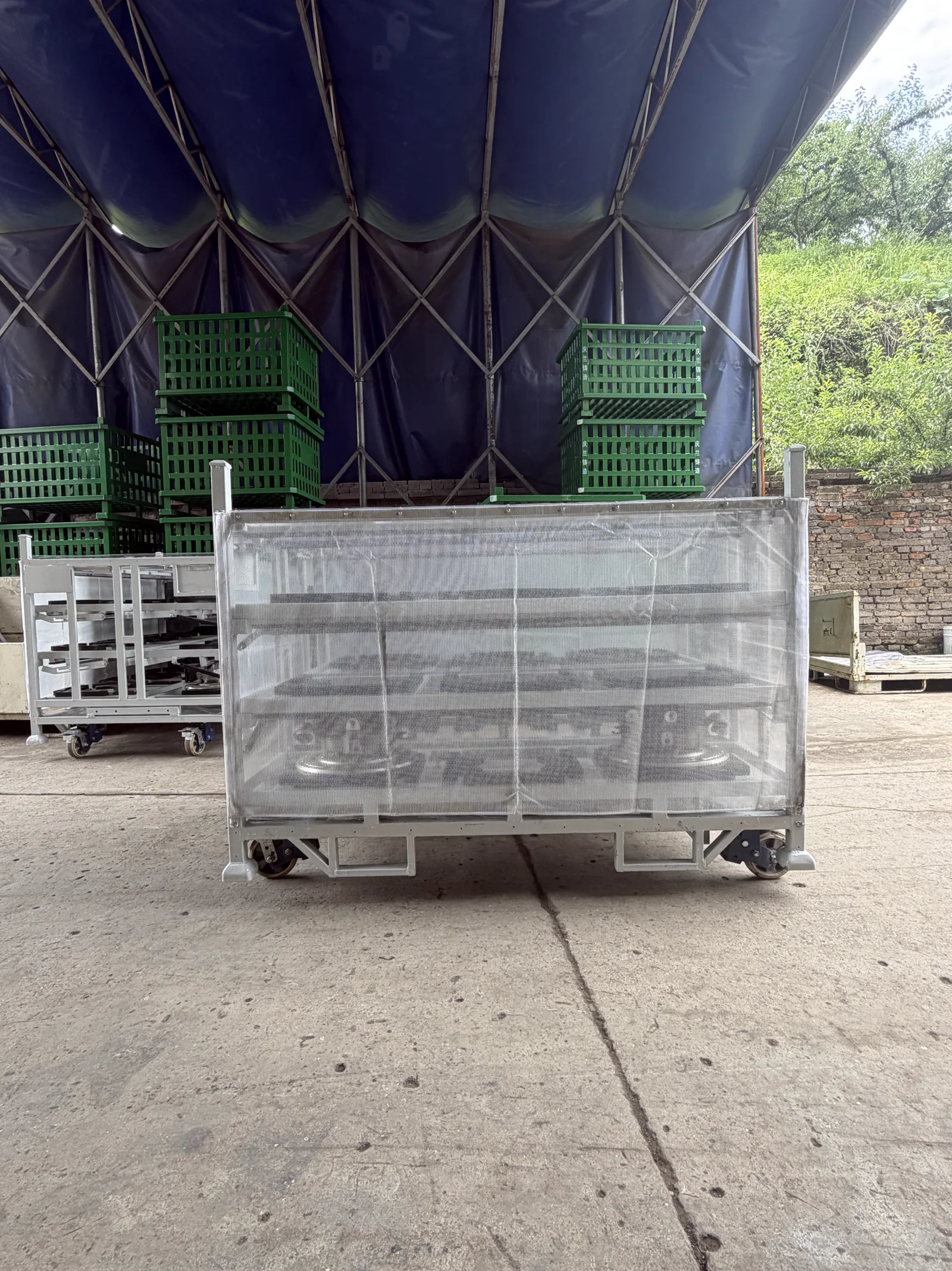 Custom automotive brake booster returnable rack with part-specific dunnage and fold-down access — configuration view 5