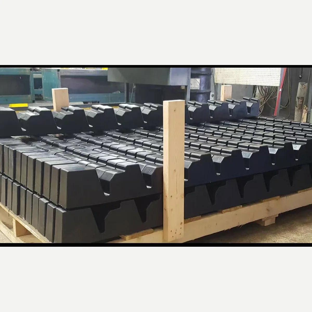 Custom yellow and black polyurethane locator blocks for automotive rack contact positions — configuration view 3