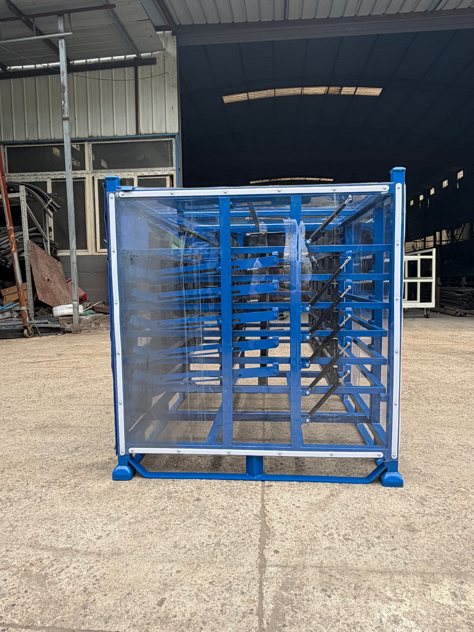 Real automotive parts rack showing covered sides and multiple loading levels for engine rack access planning